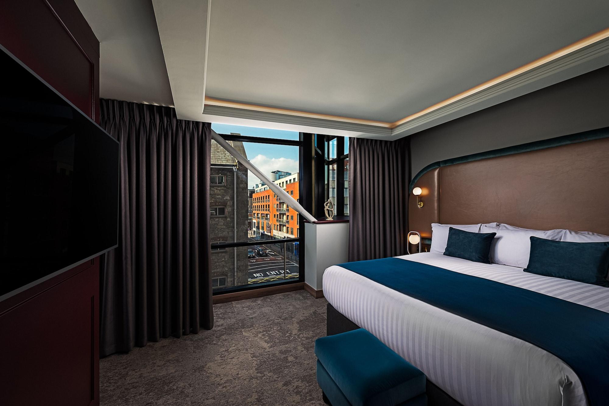 The Savoy Hotel Limerick Junction Eksteriør bilde A bedroom at the hotel