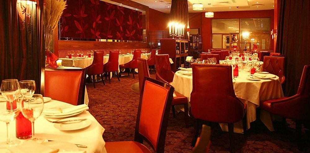 The Savoy Hotel Limerick Junction Eksteriør bilde Interior of the restaurant